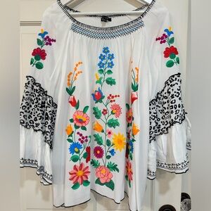 White John Mark top with colorful embroidered flowers and Leopard Print.